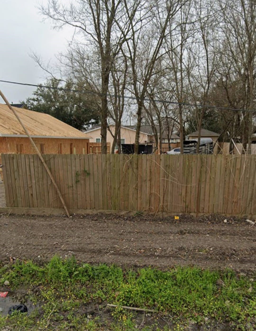 a backyard of a house with lots of green space