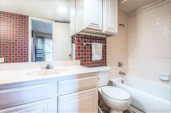 a view of a backyard with wooden floor