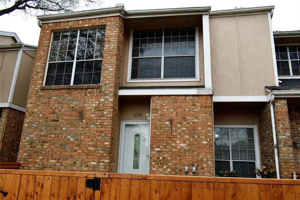 a view of swimming pool with outdoor seating and a lake view