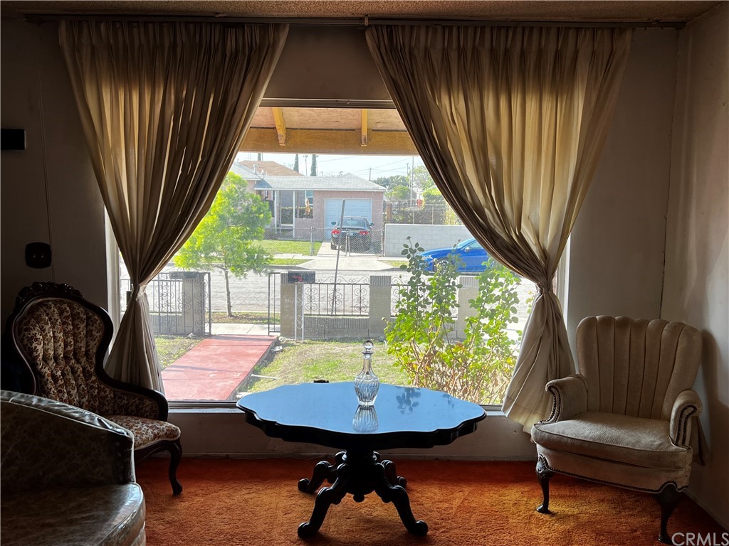 1506 South Grandee Avenue Compton, CA 90220 - Photo 6 of 35 a living room with furniture and a window