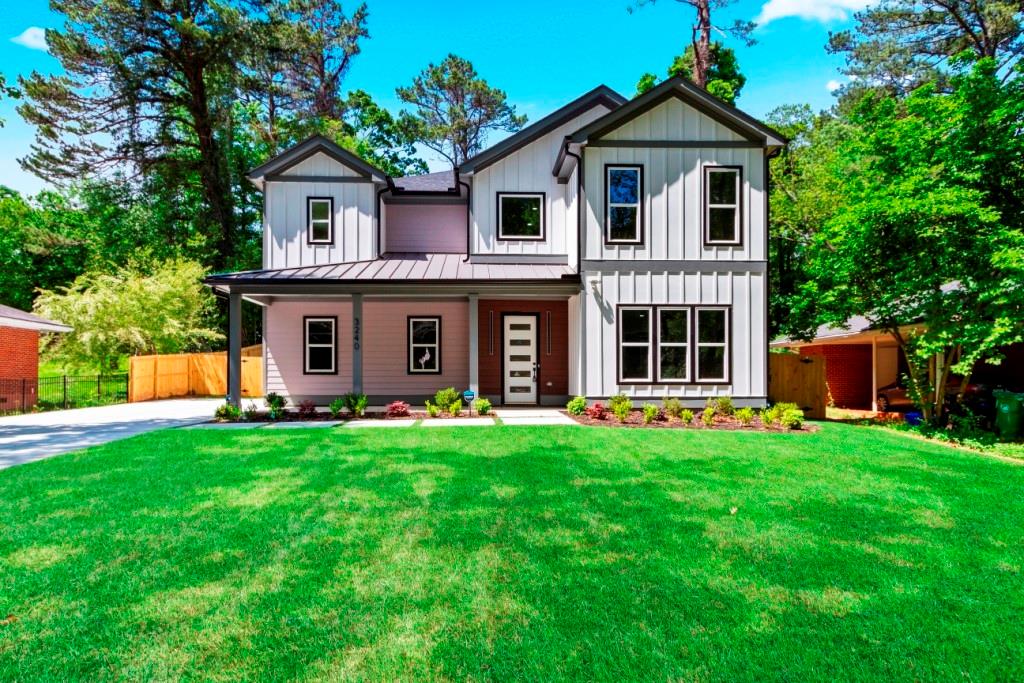 3240 Lavista Road Decatur, GA 30033 - Photo 1 of 1 a front view of a house with a yard