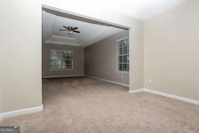 an empty room with windows