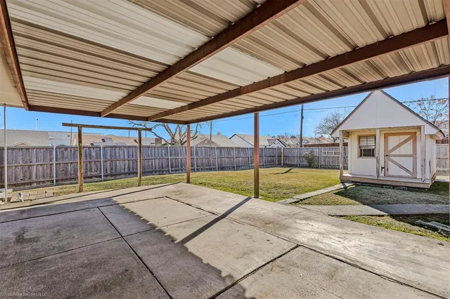 a view of pool with a backyard