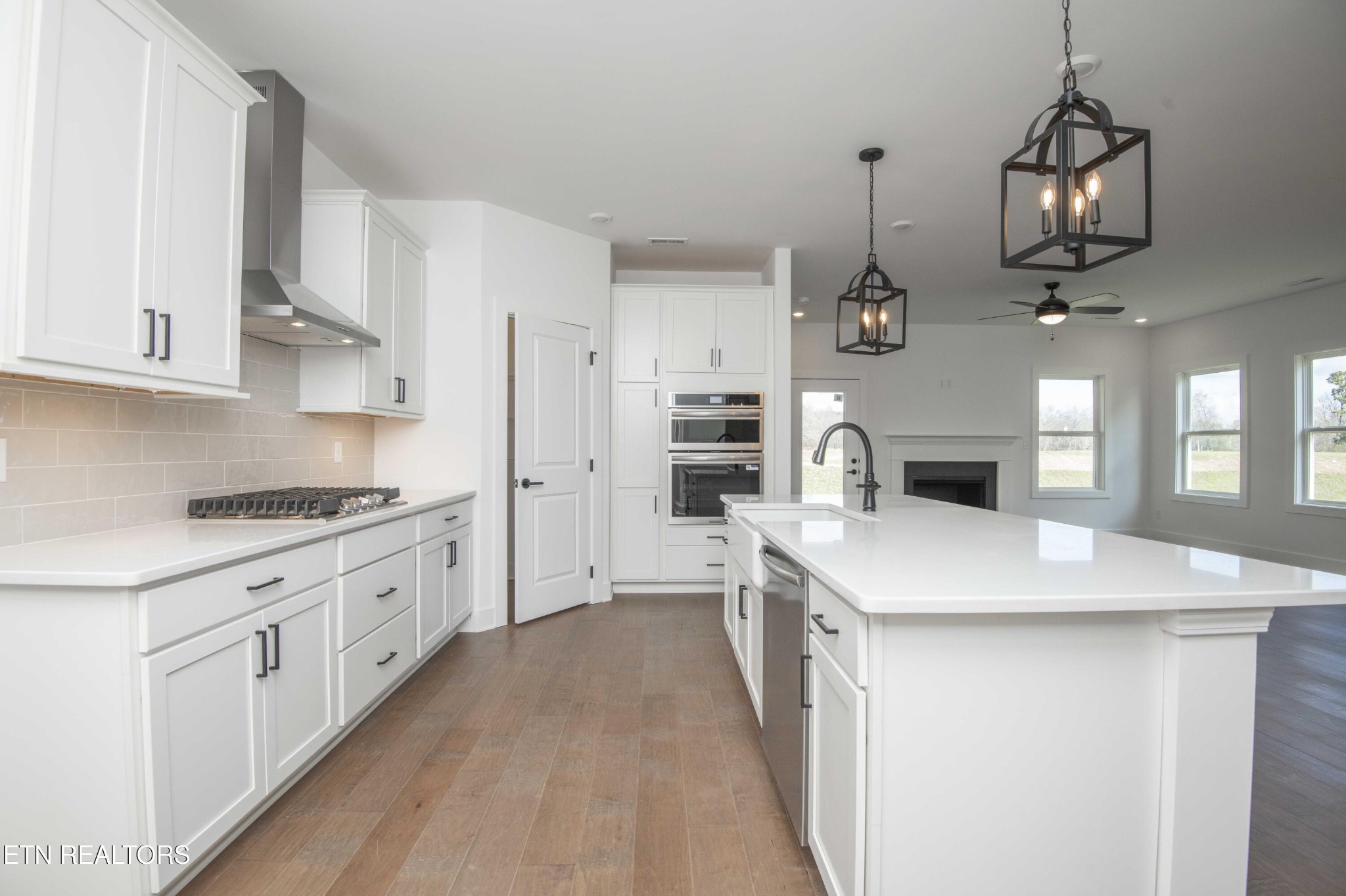 420 Ivey Farms Road Knoxville, TN 37934 - Photo 18 of 56 a kitchen with cabinets a sink and appliances