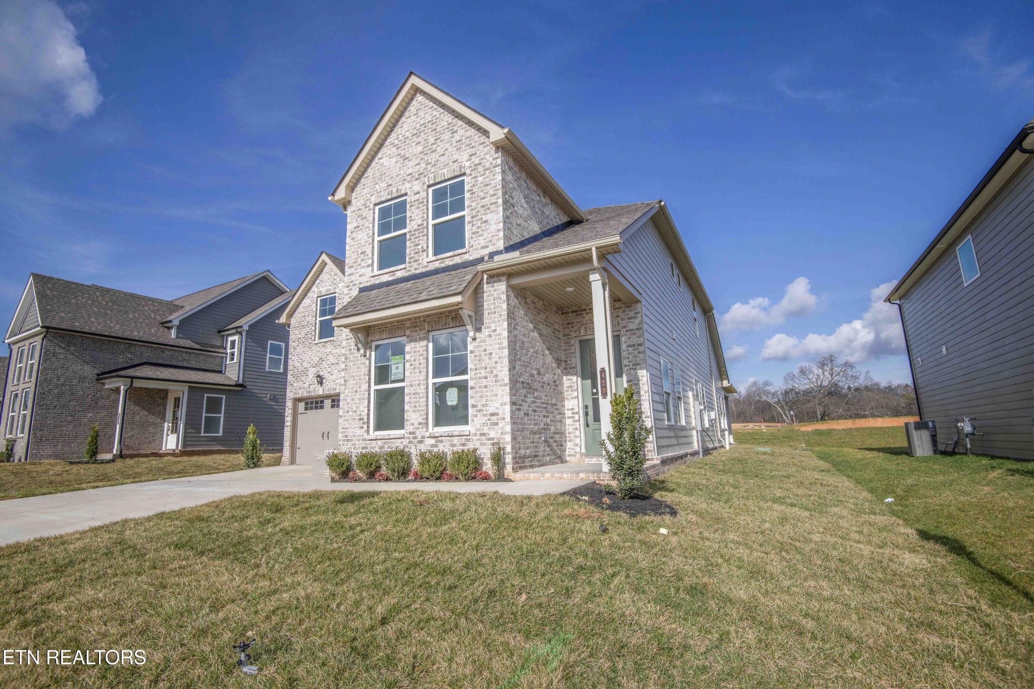 420 Ivey Farms Road Knoxville, TN 37934 - Photo 2 of 56 front view of a house with a yard