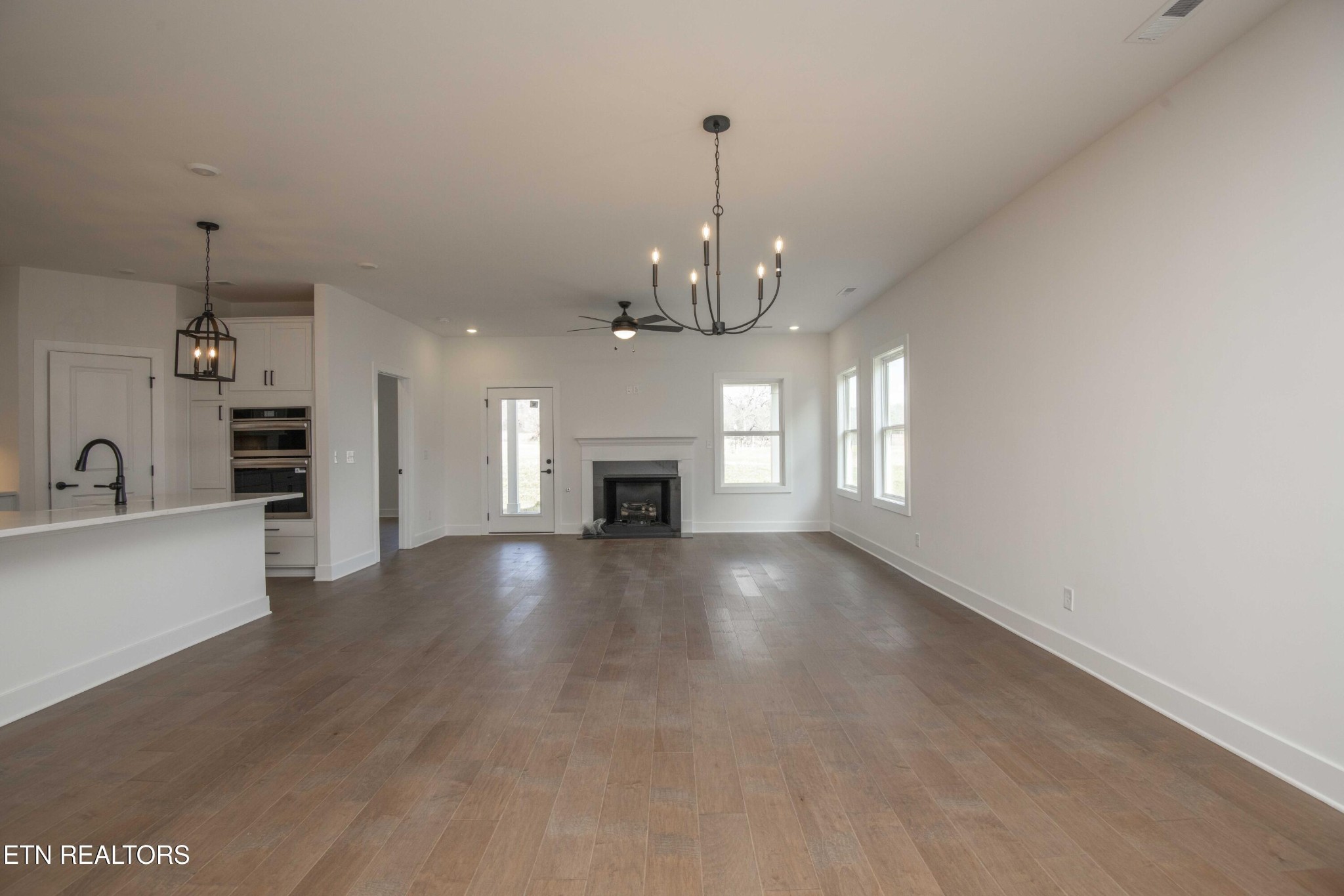 420 Ivey Farms Road Knoxville, TN 37934 - Photo 21 of 56 a view of an empty room with window and fireplace