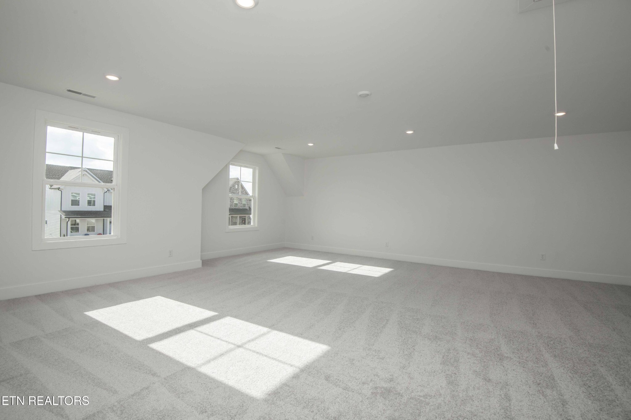 420 Ivey Farms Road Knoxville, TN 37934 - Photo 37 of 56 an empty room with windows and entrance