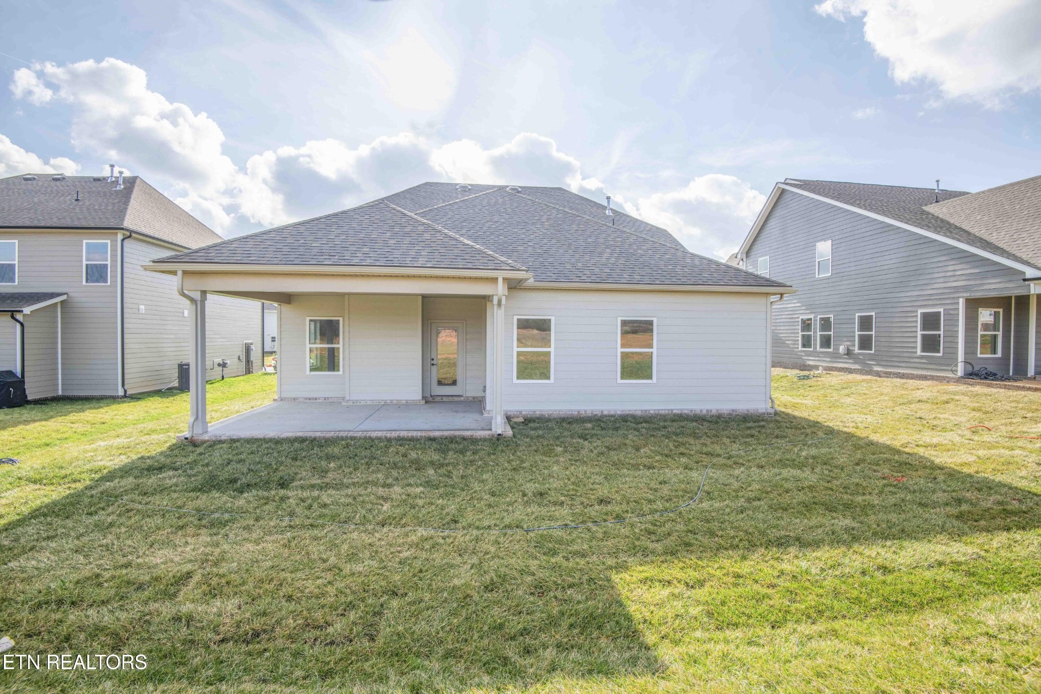 420 Ivey Farms Road Knoxville, TN 37934 - Photo 47 of 56 a house that has a big yard in front of it