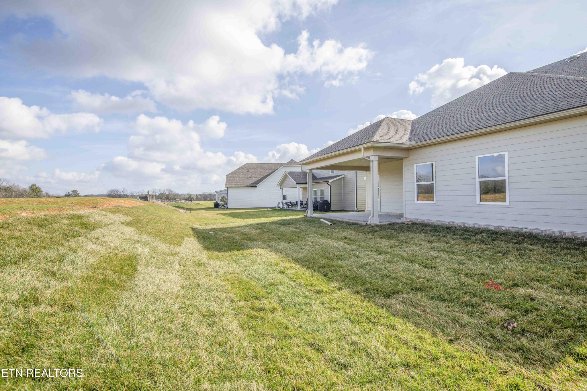 420 Ivey Farms Road Knoxville, TN 37934 - Photo 49 of 56 a view of a house with a backyard