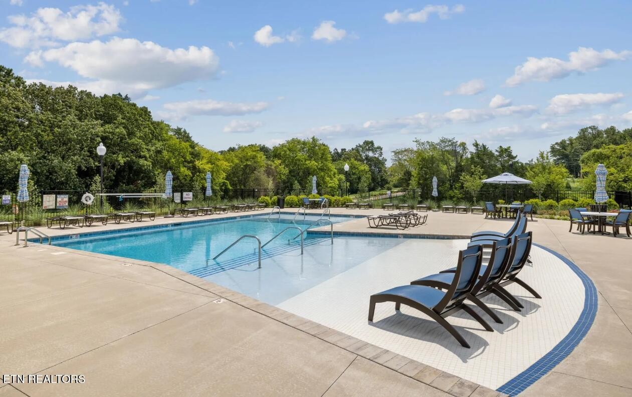 420 Ivey Farms Road Knoxville, TN 37934 - Photo 55 of 56 a swimming pool with outdoor seating and yard