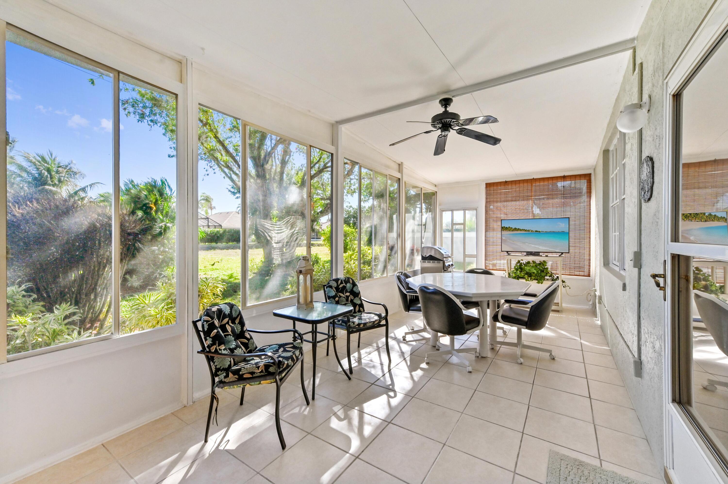 7724 Mansfield Hollow Road Delray Beach, FL 33446 - Photo 16 of 35 Screened, enclosed patio