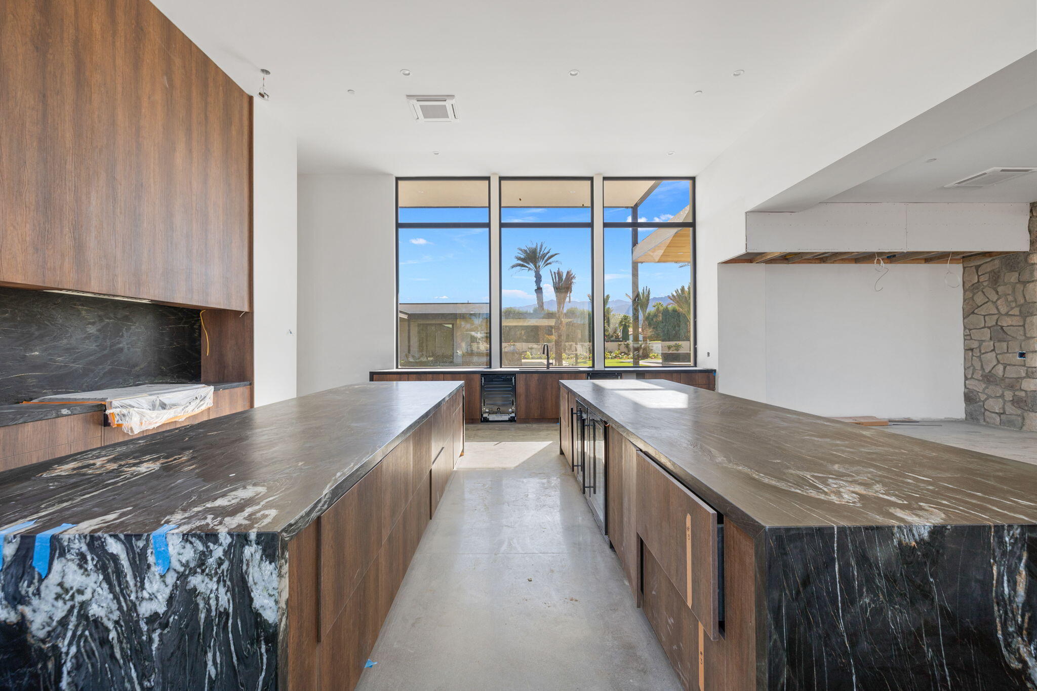 3 Shakespeare Court Rancho Mirage, CA 92270 - Photo 15 of 35 a view of a kitchen with a sink and cabinets