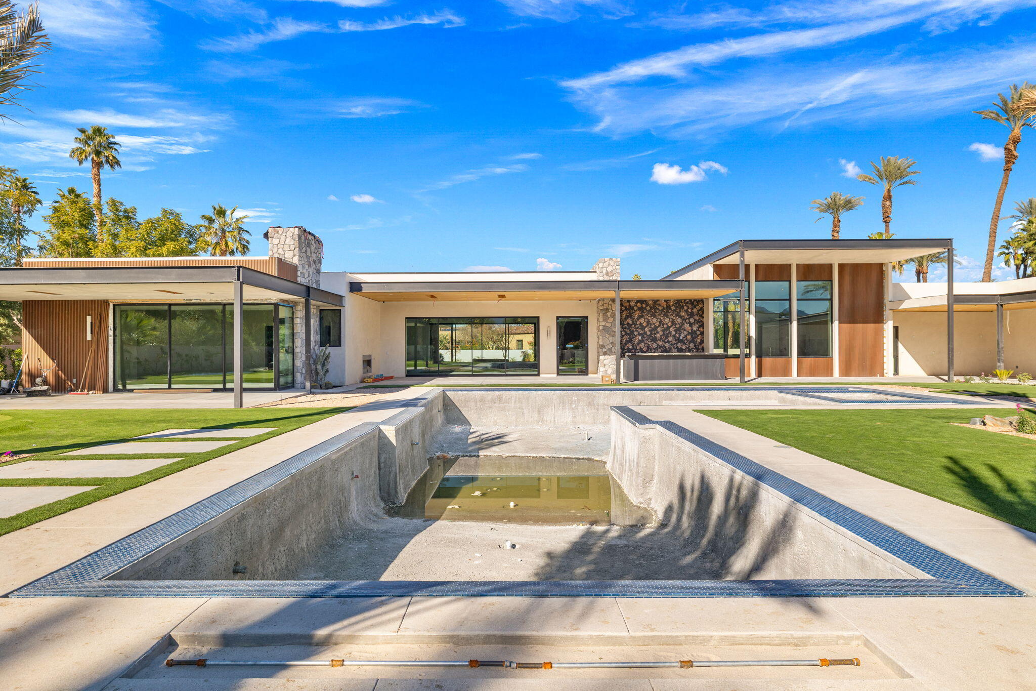 3 Shakespeare Court Rancho Mirage, CA 92270 - Photo 31 of 35 a view of a house with swimming pool
