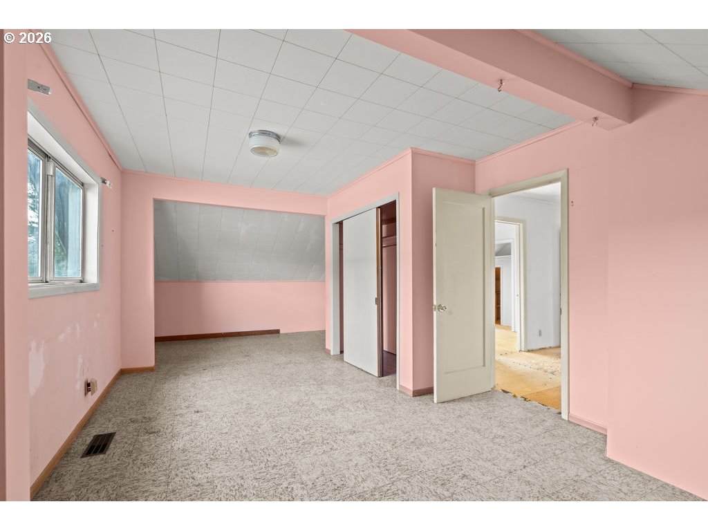 5235 Brickyard Road Tillamook, OR 97141 - Photo 11 of 14 a big room with closet and windows