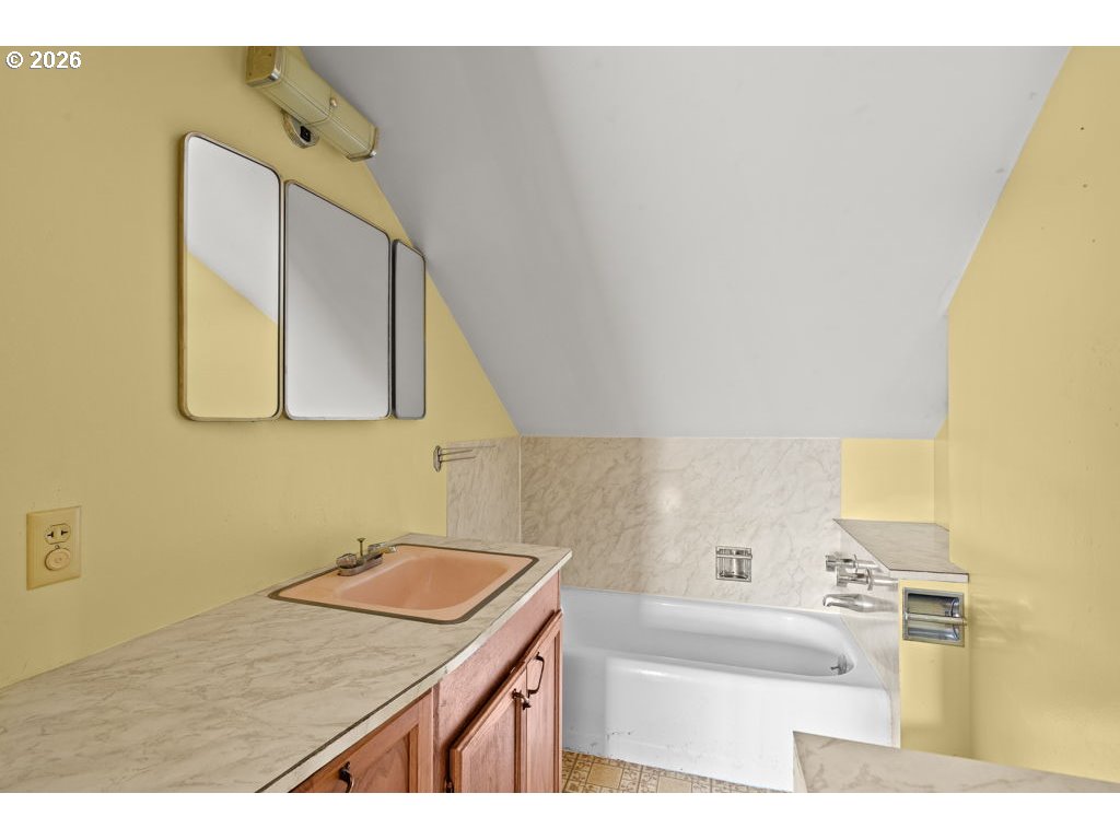 5235 Brickyard Road Tillamook, OR 97141 - Photo 10 of 14 a bathroom with a sink and a mirror