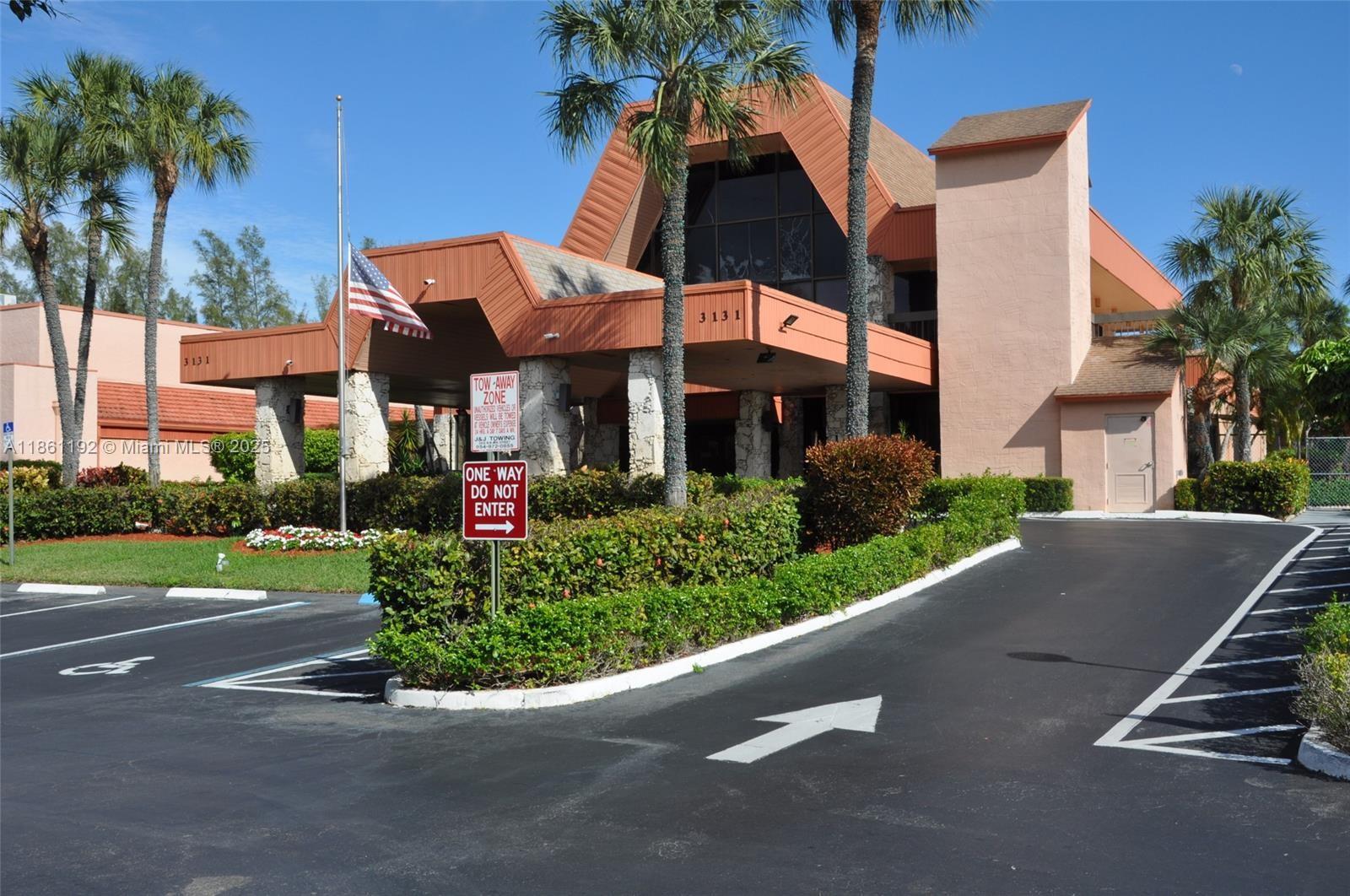 3090 Holiday Springs Boulevard, Unit 206 Margate, FL 33063 - Photo 14 of 41 a view of a street with a house