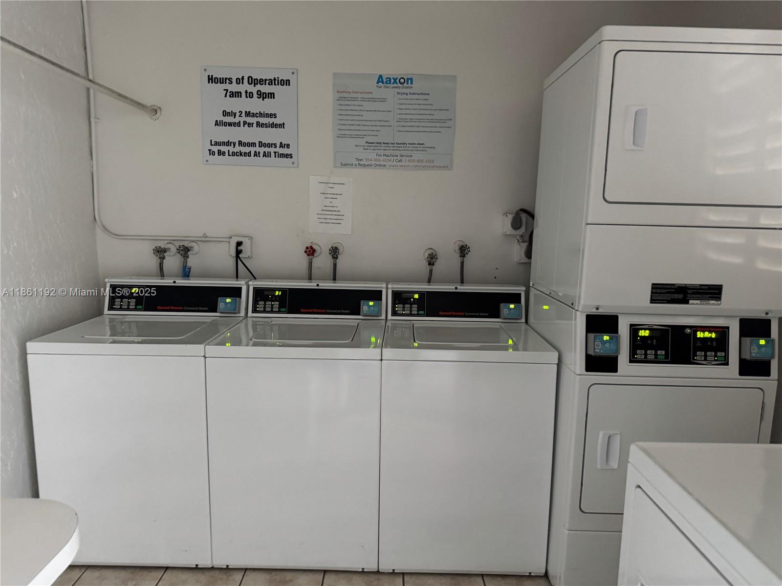 3090 Holiday Springs Boulevard, Unit 206 Margate, FL 33063 - Photo 15 of 41 a utility room with dryer and washer