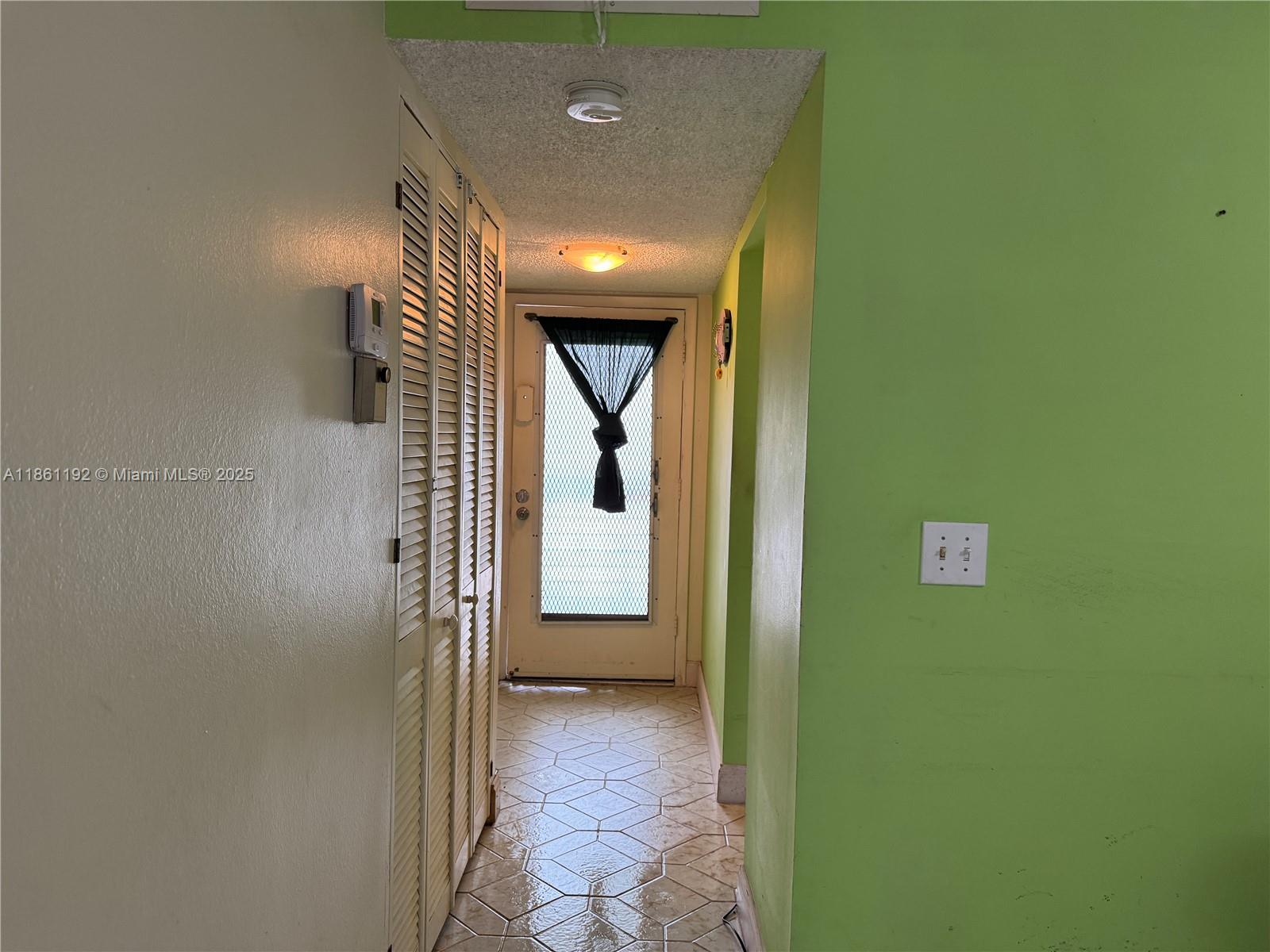 3090 Holiday Springs Boulevard, Unit 206 Margate, FL 33063 - Photo 29 of 41 a view of a hallway