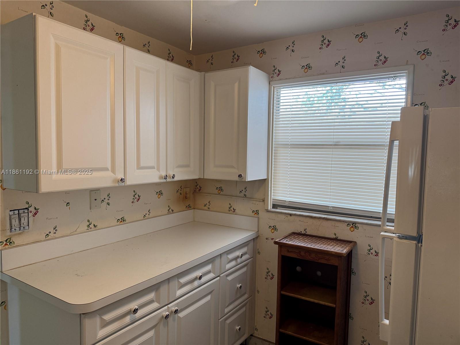 3090 Holiday Springs Boulevard, Unit 206 Margate, FL 33063 - Photo 38 of 41 a room with storage and utility