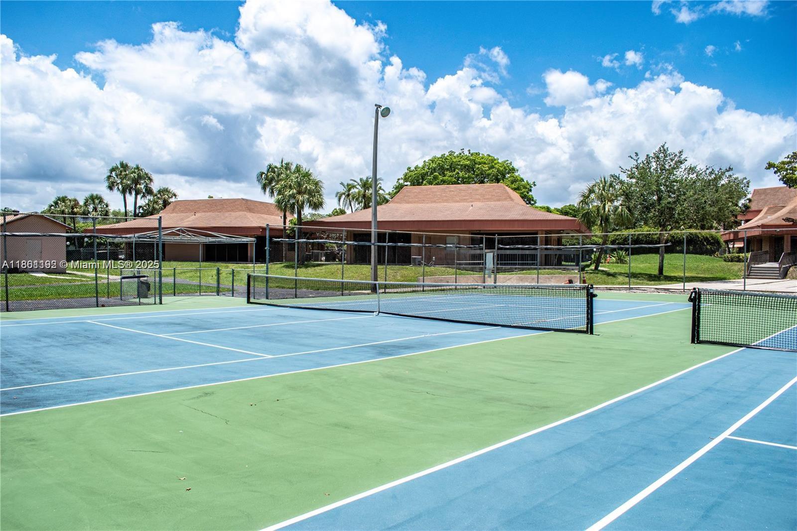 3090 Holiday Springs Boulevard, Unit 206 Margate, FL 33063 - Photo 9 of 41 a view of a park with slide