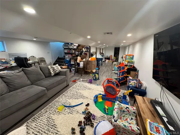 a living room filled with furniture and a couch