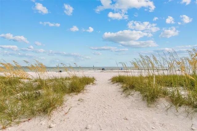 a sign that is sitting in front of a building