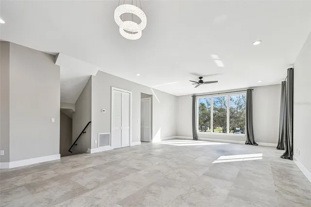 a view of livingroom with furniture and window