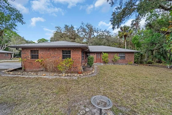 a front view of house with yard