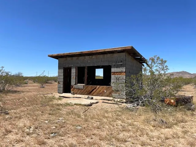 a view of mountain view with mountains in the background