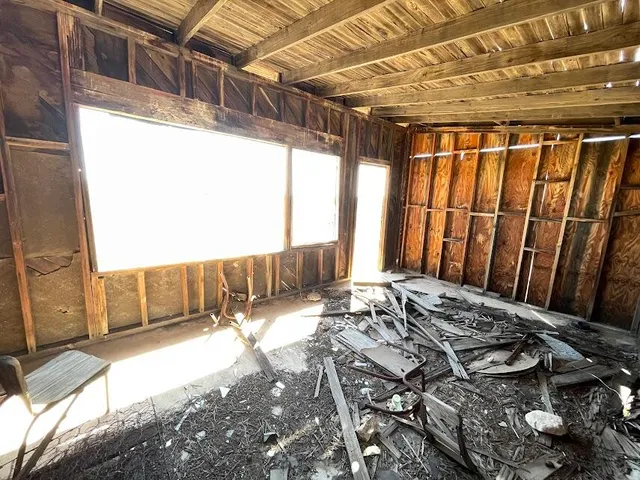 a view of a backyard of a house