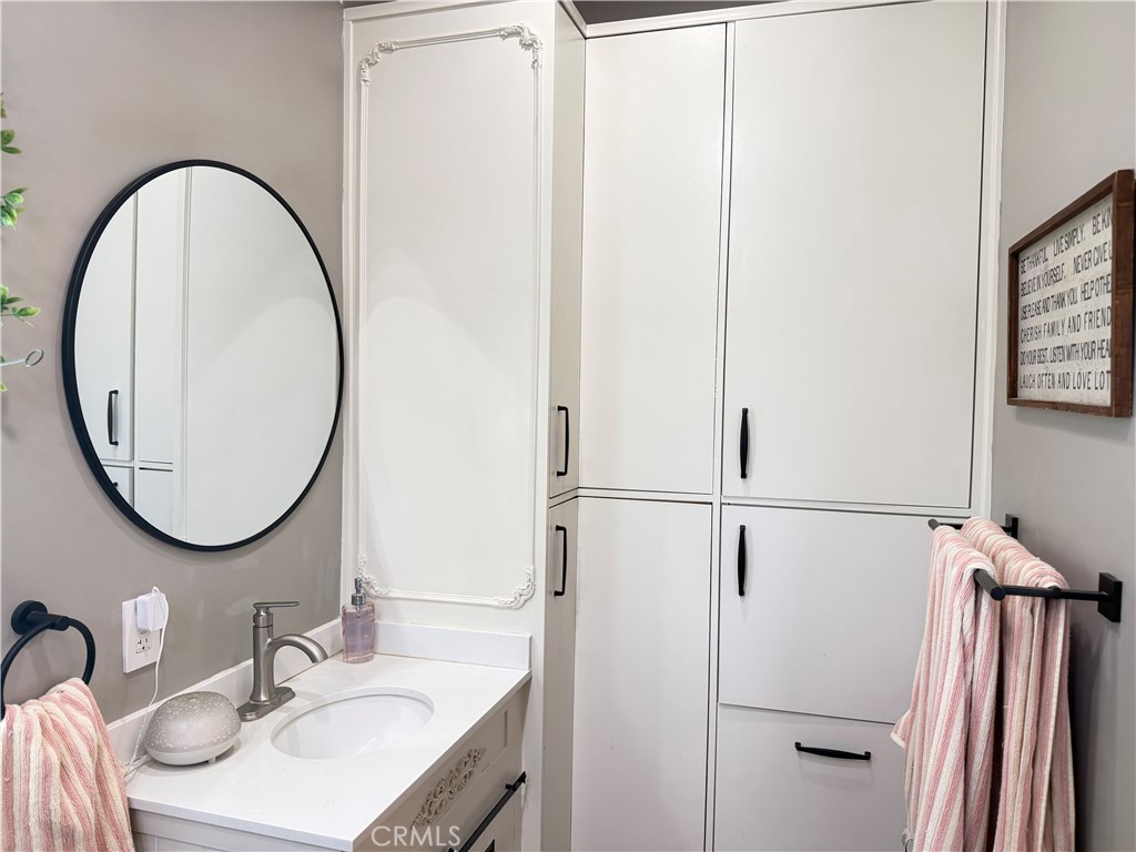 3701 Fillmore Street, Unit 10 Riverside, CA 92505 - Photo 29 of 38 Primary Bathroom With Linen Storage