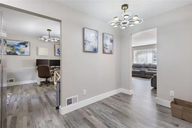 a workspace with wooden floor and workspace