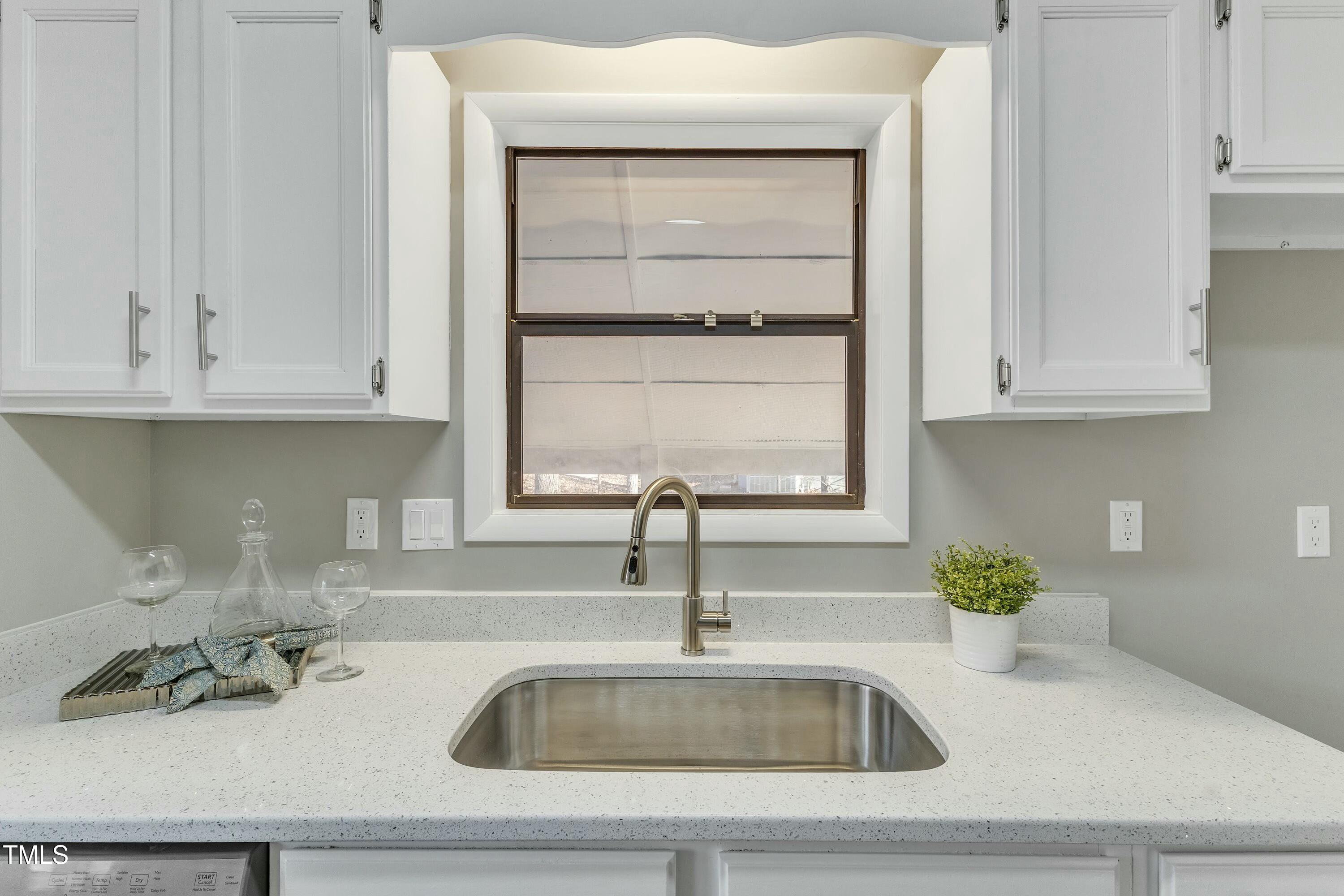 1432 Fairway Ridge Drive Raleigh, NC 27606 - Photo 15 of 40 Single bowl kitchen sink with window view