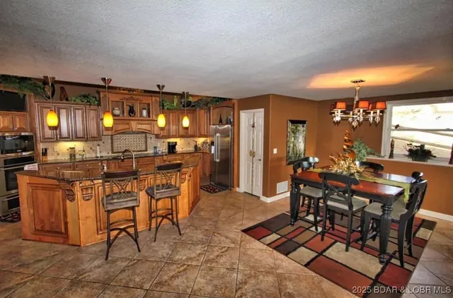 $925,000 | 135 Windy Cove, Roach, MO 65787