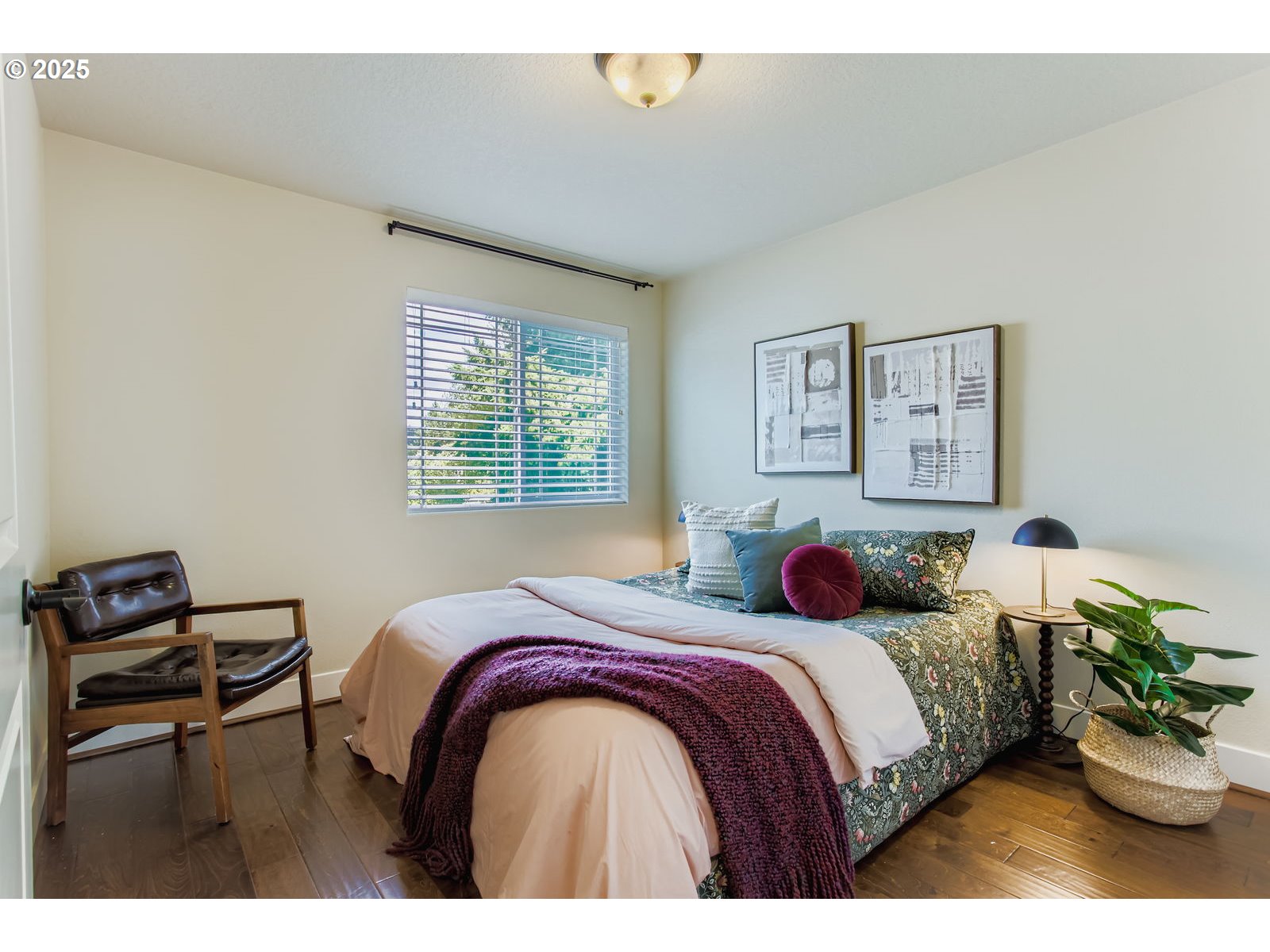 13575 Southwest Calabash Terrace Sherwood, OR 97140 - Photo 22 of 31 a bedroom with a bed and a chair