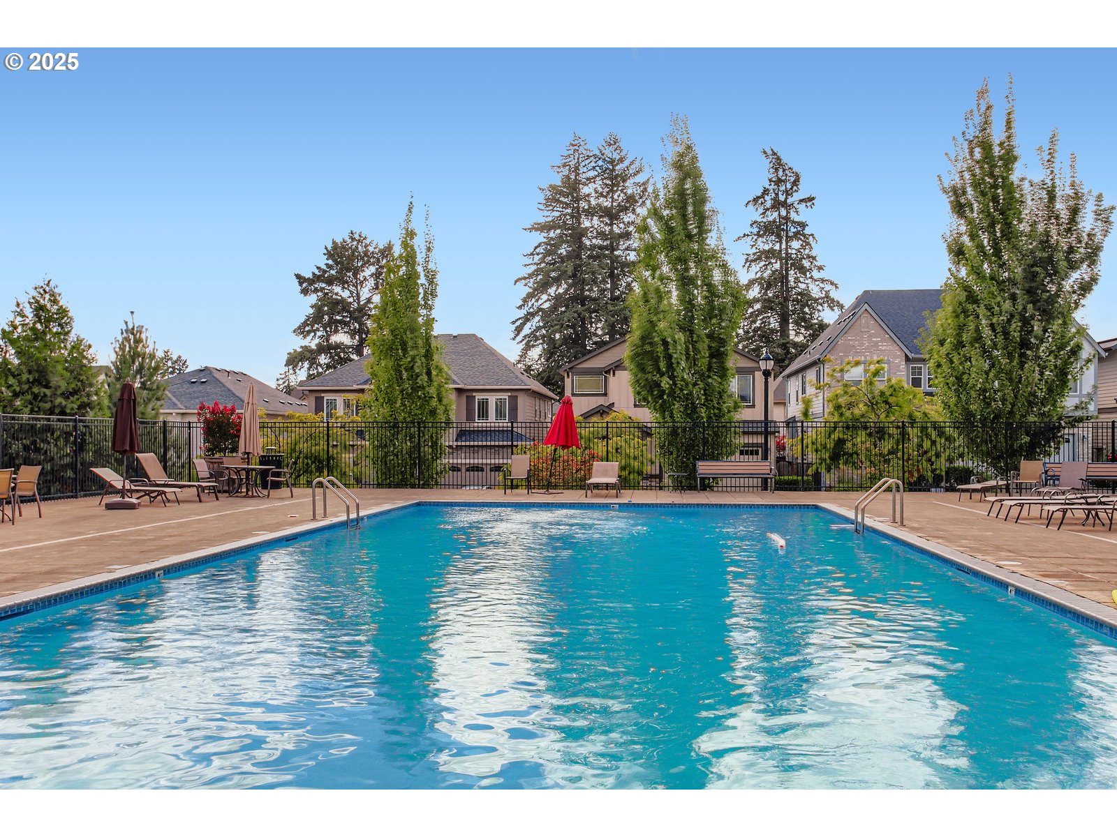 13575 Southwest Calabash Terrace Sherwood, OR 97140 - Photo 28 of 31 a swimming pool with outdoor seating and yard