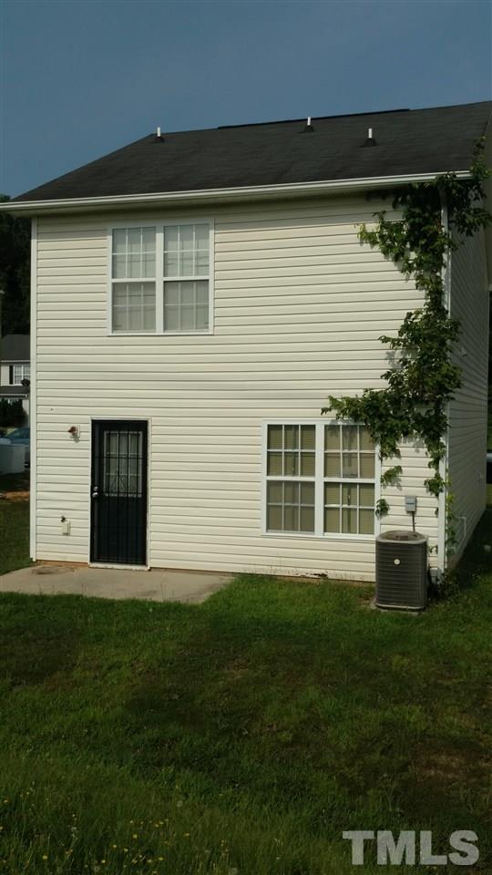 4321 Haverty Drive Raleigh, NC 27610 - Photo 2 of 5 a front view of a house with a yard
