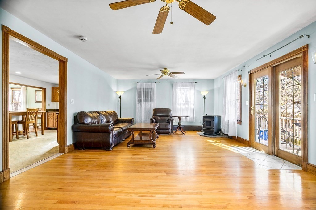 85 Pleasant Circle Canton, MA 02021 - Photo 14 of 35 a living room with furniture window and wooden floor
