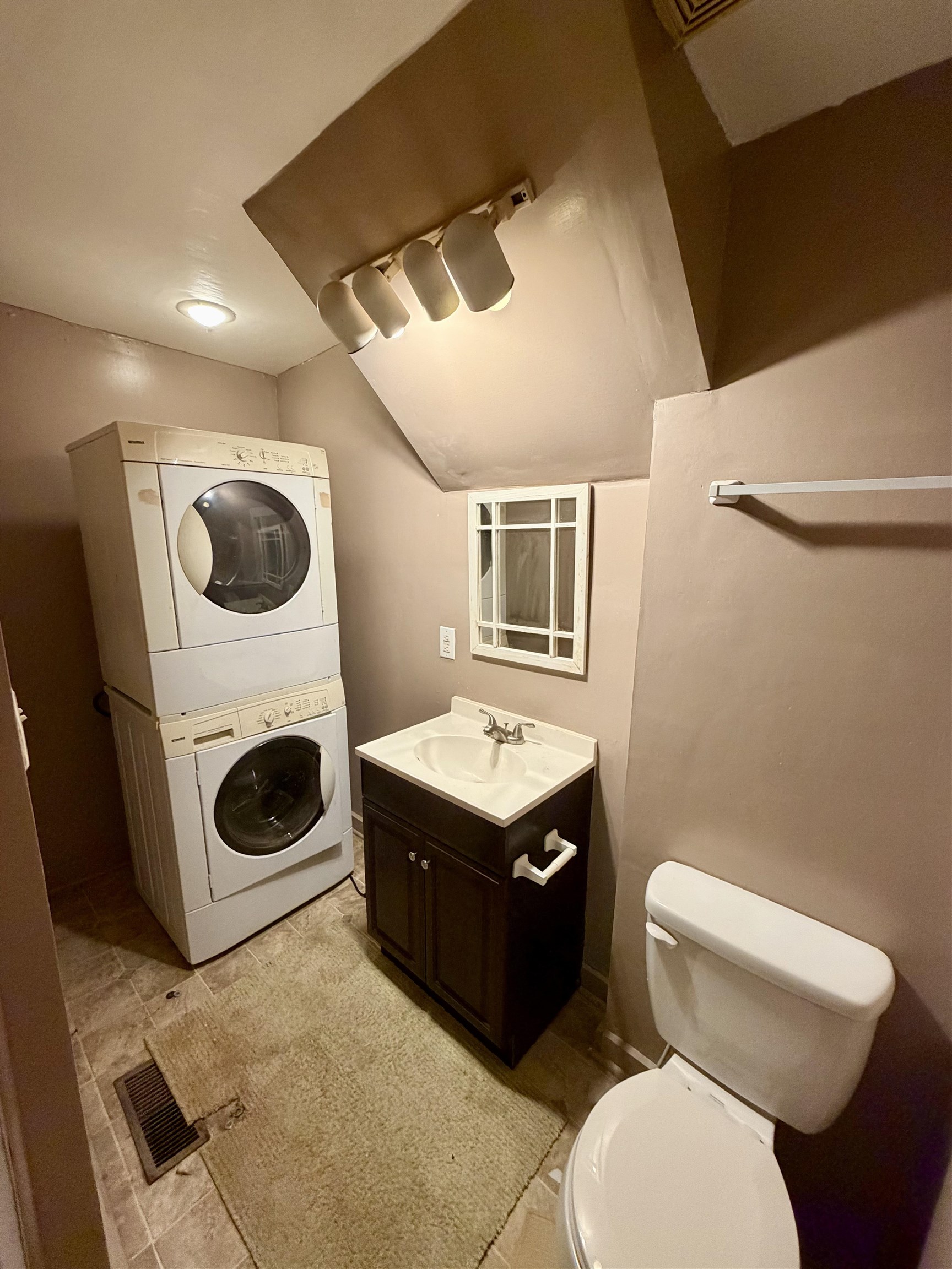 3648 Middlebrook Village Road Middlebrook, VA 24459 - Photo 15 of 48 a bathroom with a toilet sink washing machine and mirror