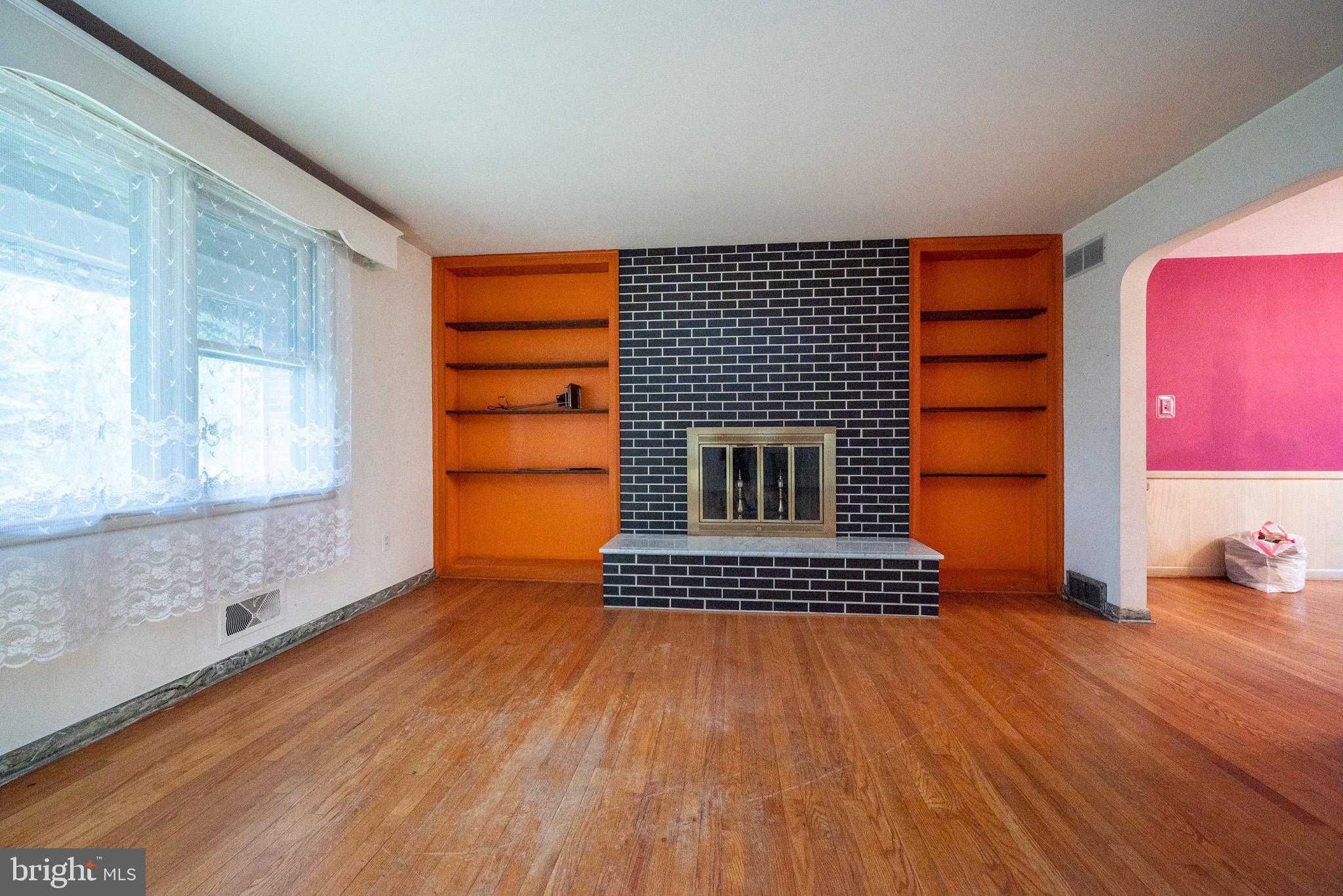110 Mulberry Road Newark, DE 19711 - Photo 9 of 42 ...with fireplace and built in shelves...