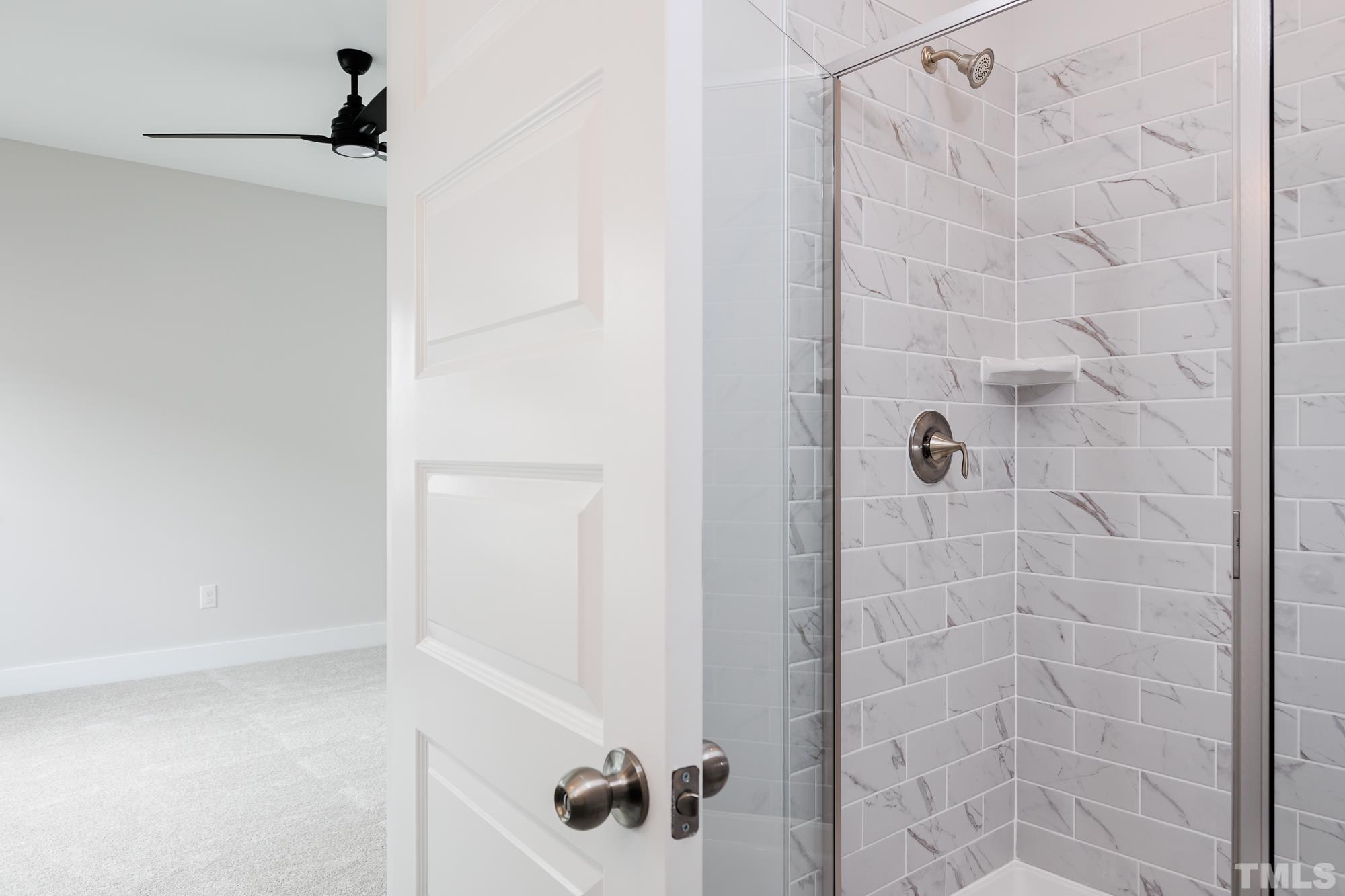 8105 Diversy Way Raleigh, NC 27613 - Photo 6 of 9 a bathroom with a shower