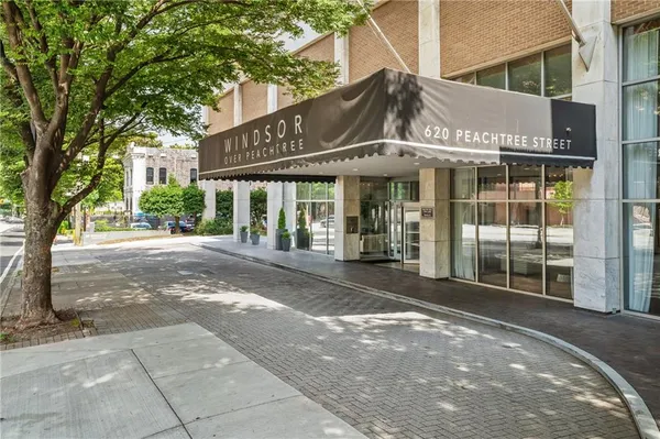 a view of a building with a garden