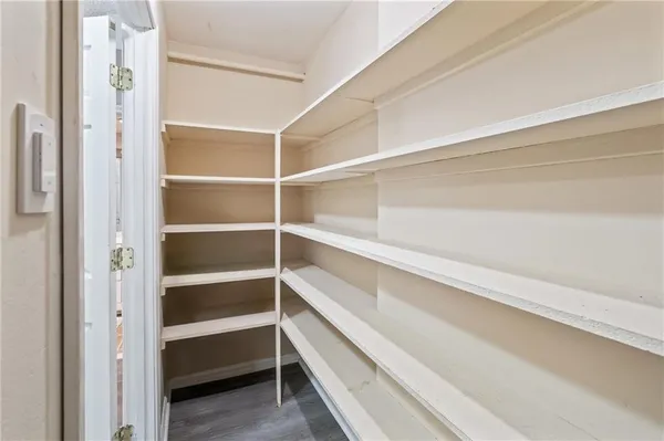 a storage room with washer and dryer