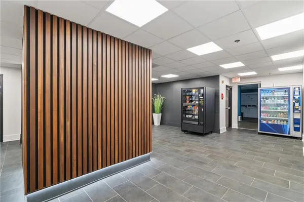 a view of an empty room with an entryway