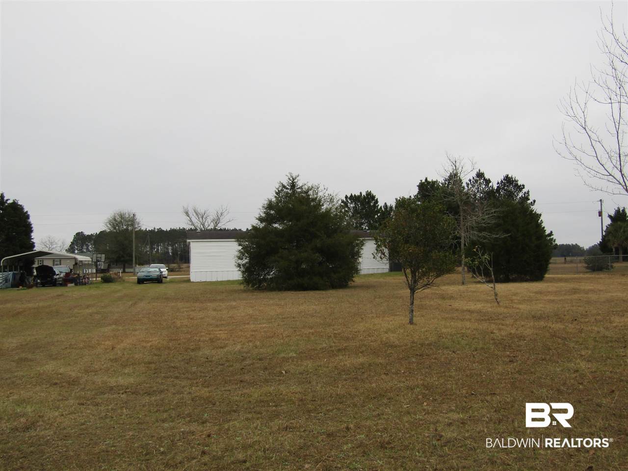 33172 Gilley Road Lillian, AL 36549 - Photo 7 of 24 Looking back from shed to house