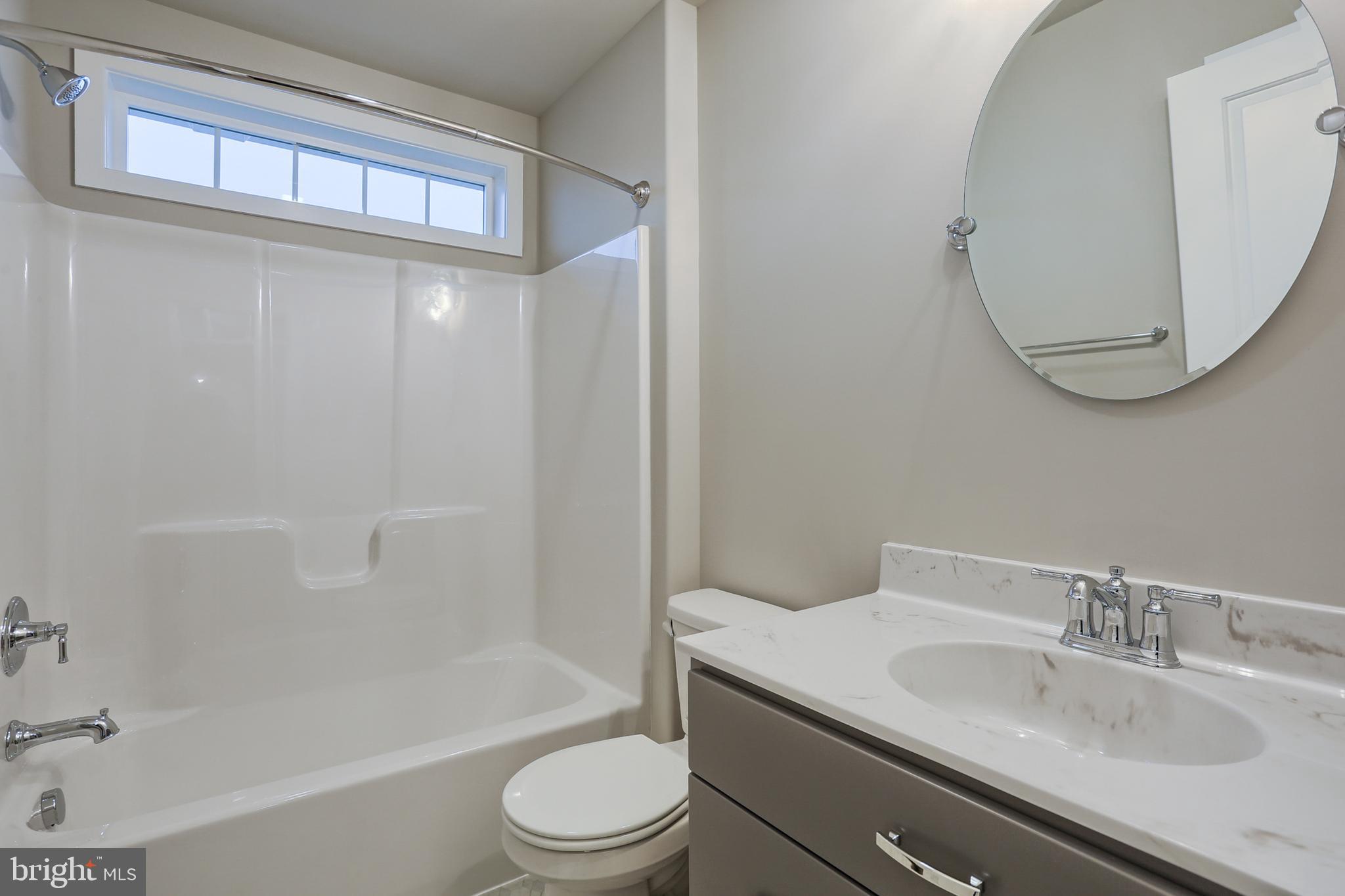 16 Rolling Meadow Road Lebanon, PA 17046 - Photo 12 of 21 a bathroom with a granite countertop sink toilet and shower