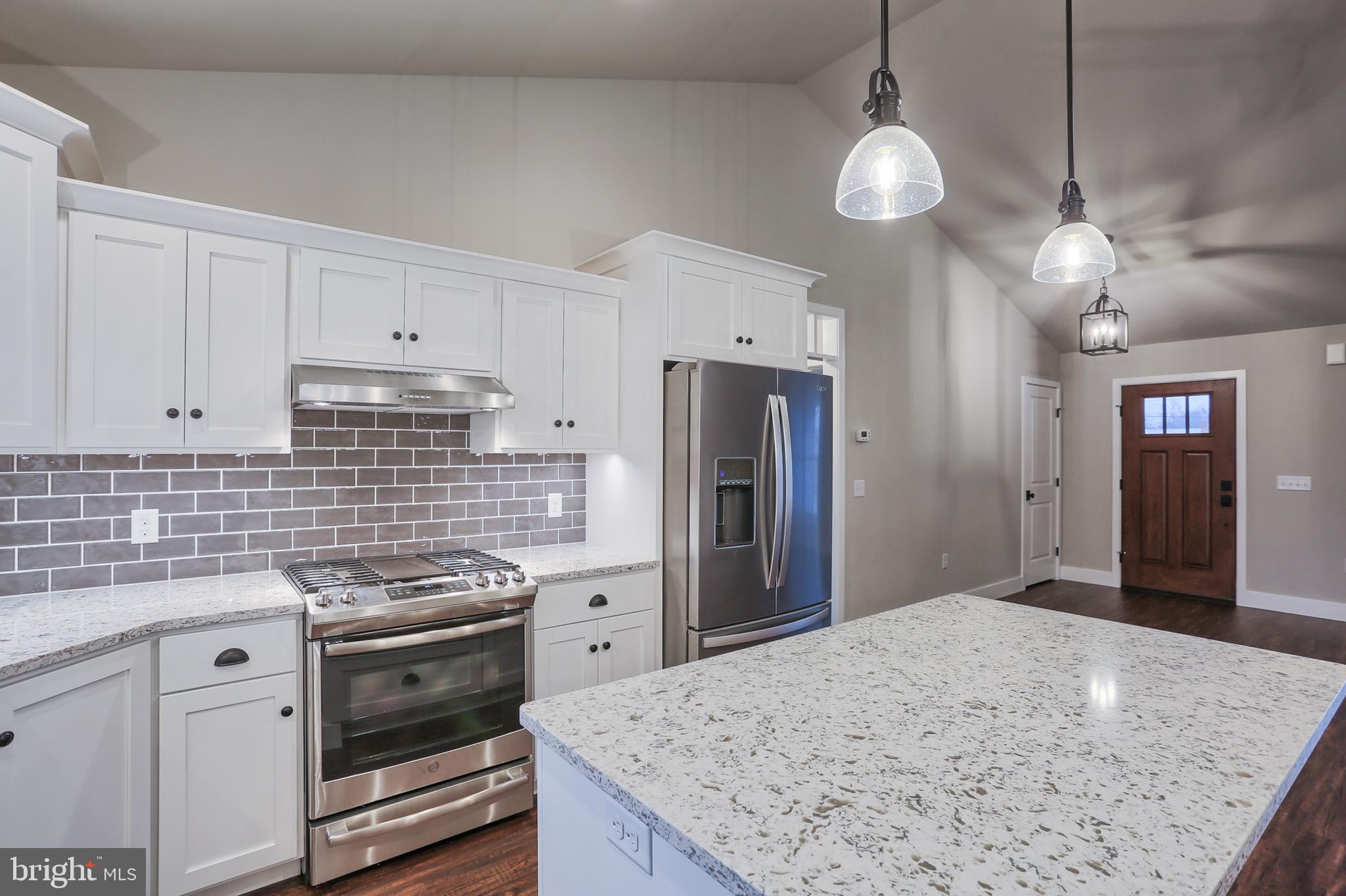 16 Rolling Meadow Road Lebanon, PA 17046 - Photo 8 of 21 a kitchen with stainless steel appliances granite countertop a sink stove and refrigerator