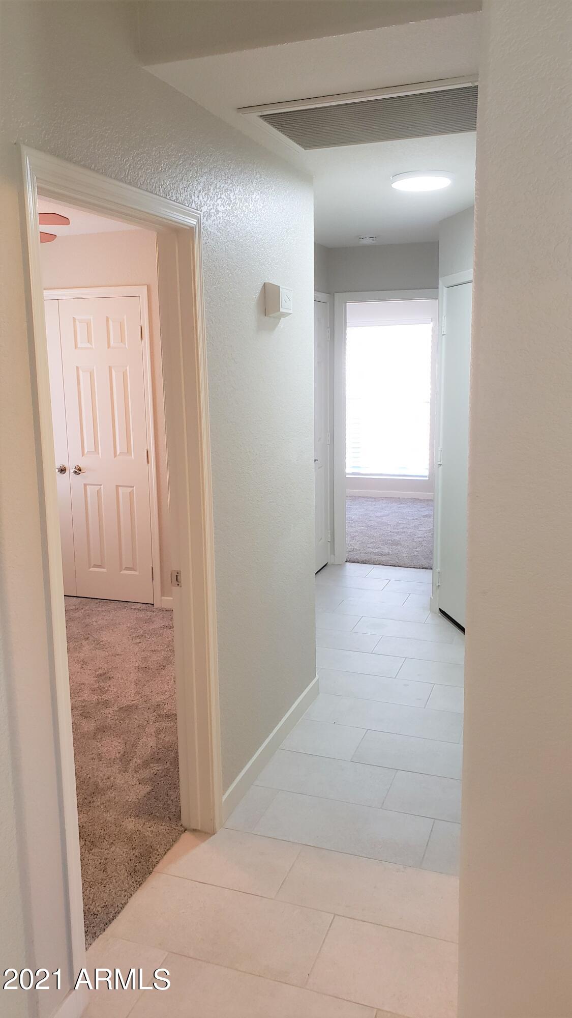16632 North 35th Place Phoenix, AZ 85032 - Photo 19 of 30 Hallway to Bedrooms 2 & 3