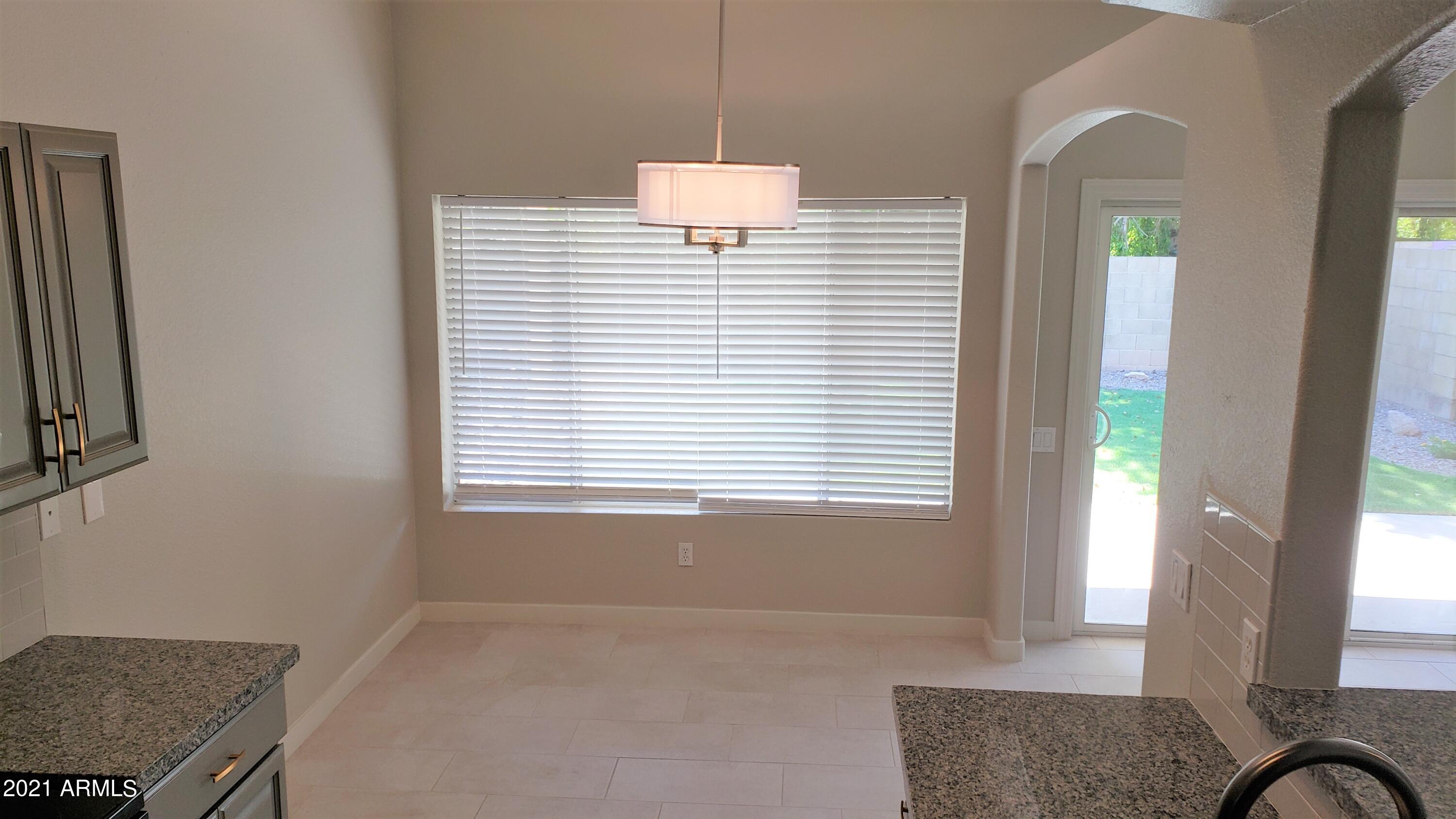 16632 North 35th Place Phoenix, AZ 85032 - Photo 8 of 30 Looking into Dining Room from Kitchen