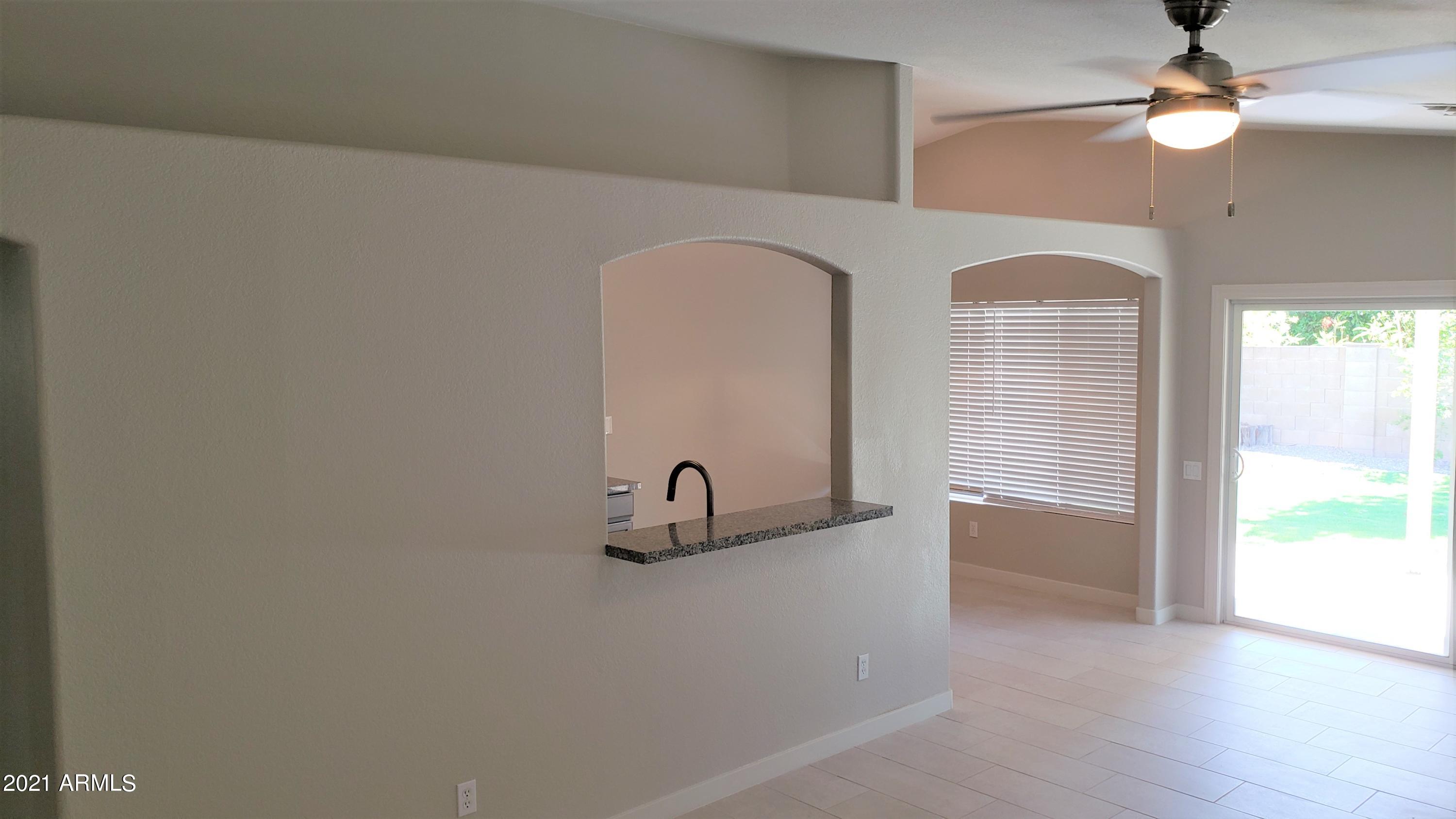 16632 North 35th Place Phoenix, AZ 85032 - Photo 9 of 30 Passthrough into Kitchen